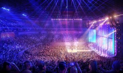an arena with a concert and lights