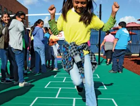 Girl Playing Hopscotch